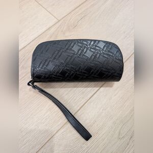 Oakley zippered sunglasses case with an all-over logo pattern
